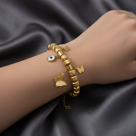 Gold Charm Bracelet with Evil Eye & Butterfly Motifs