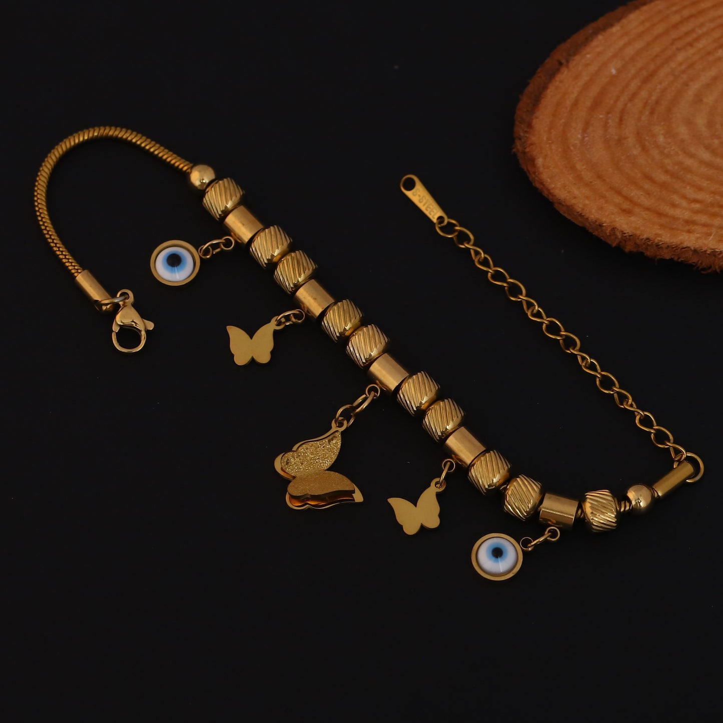Gold Charm Bracelet with Evil Eye & Butterfly Motifs