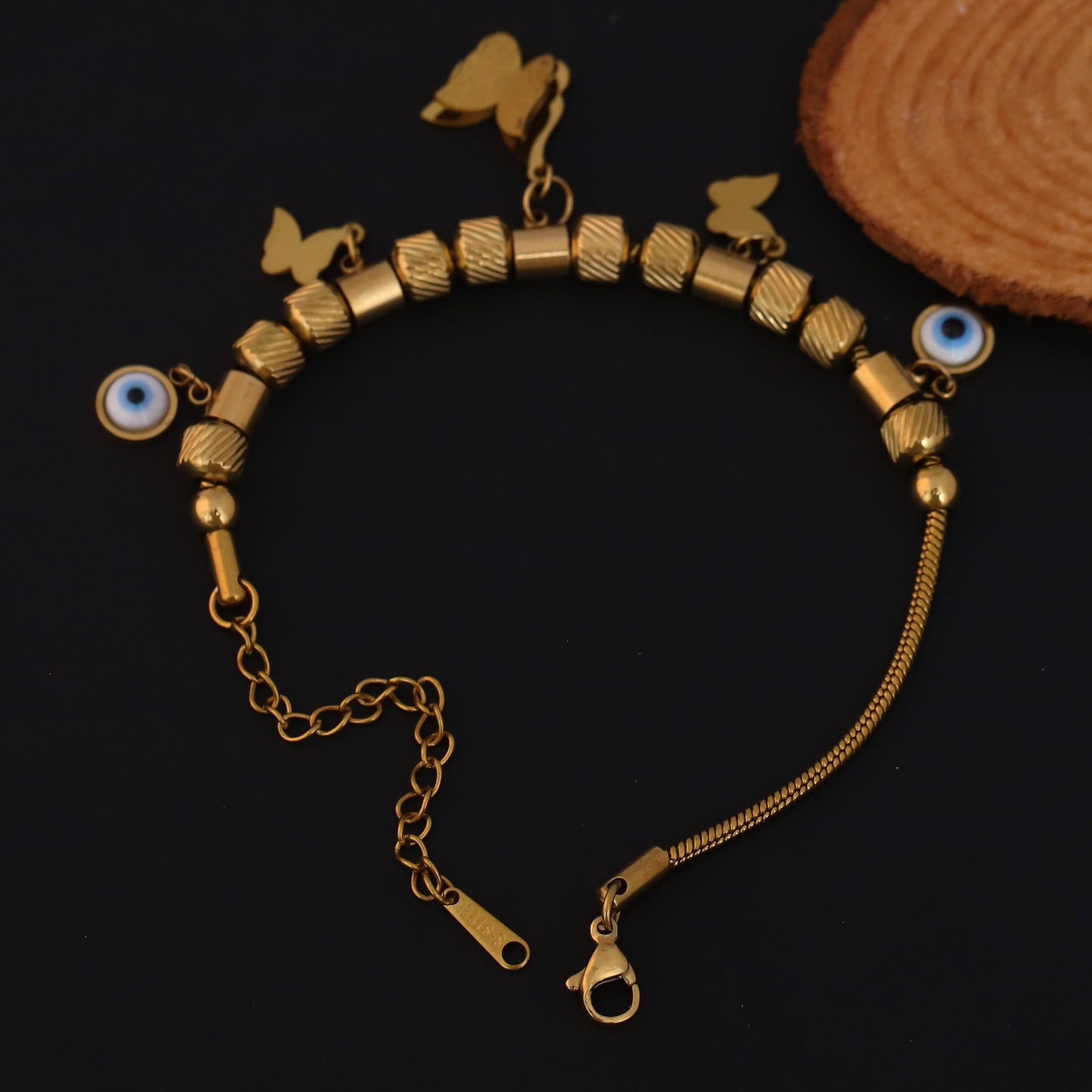 Gold Charm Bracelet with Evil Eye & Butterfly Motifs