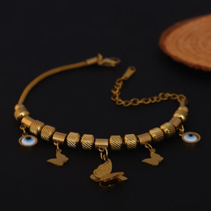Gold Charm Bracelet with Evil Eye & Butterfly Motifs